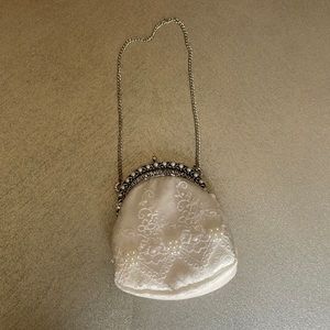 Tiny little white vintage purse